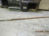 an image of a long stick laying on the floor