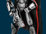 sideshot of a star wars figurine of a stormtrooper holding a gun