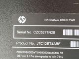 the back side of a laptop with a sticker on it