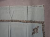 an image of a piece of cloth with a bird on it