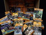 a lot of books in a box on the floor