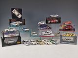 a lot of different models of cars in a display case
