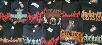 many t - shirts that are on display in a store