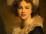 portrait of a woman in a white hat and black dress