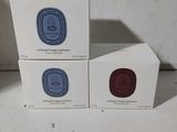 three boxes of soap sitting next to each other on a table