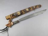 a knife that is laying on a table