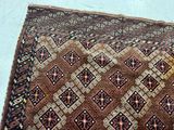 a rug with a pattern on it on the floor