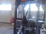 a picture of a forklift truck in a garage