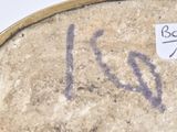a close up picture of a bowl with writing on it