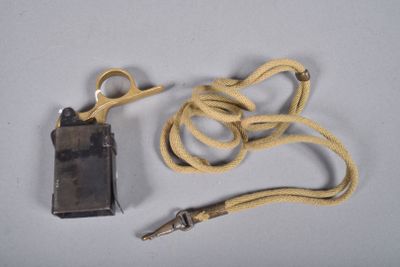 a cell phone and a cord on a table