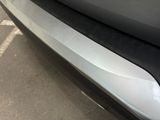 a close up of the front bumper of a car
