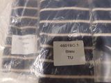 a bag of socks sitting on a table with a label on it