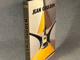 the book jean golden is sitting on a gray surface