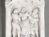 an image of a statue of a woman holding a child