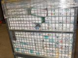 a cart with a lot of boxes on it in a warehouse