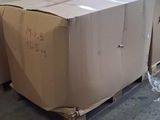 a large cardboard box sitting on a pallet in a warehouse