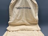 Valise Louis Vuitton en toile beige avec logo noir