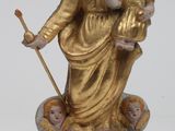 une image représentant une statue d'une femme tenant un enfant dans ses bras, assise sur un trône
