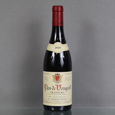 a bottle of wine that is sitting on a table