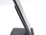 a close up of a cell phone on a stand