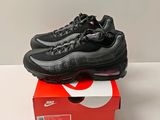 the nike air max 95 is in a box on a table
