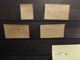 a piece of paper taped to a black filing cabinet