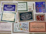many different types of arabic calligraphys laid out on the floor