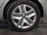 a close up of a tire on a car ' s rim
