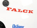 a white helmet with the word falcok written on it