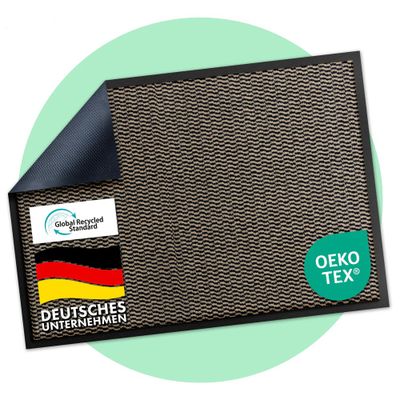 un gros plan sur un tapis noir orné d'un drapeau allemand
