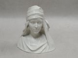 a white statue of a woman with a veil on her head