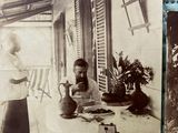 two old black and white photos of a man and a woman sitting on a porch