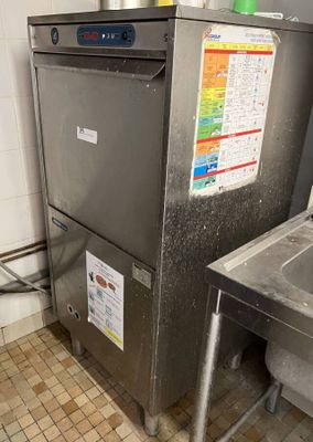 a stainless steel dishwasher and a sink in a kitchen