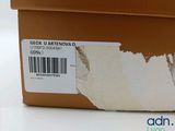 a box with a sticker on it sitting on a table