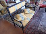 an image of a living room with a couch and a rug