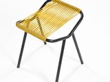 a yellow chair with black legs and a black frame