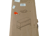 a cardboard box with a drawing of a coffee table on it