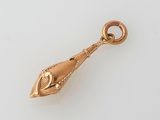 an image of a gold plated pendant with a fish on it