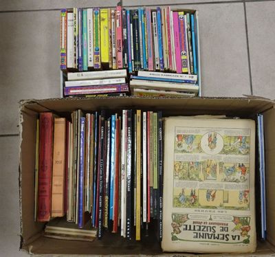 a box full of books sitting on the floor