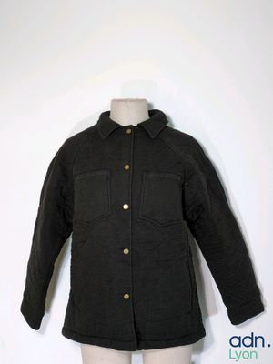 an image of a black jacket on a mannequin mannequin