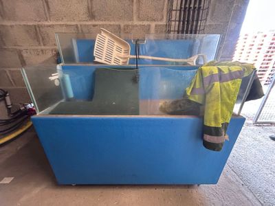 a blue box with a yellow jacket and a yellow jacket on it
