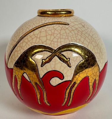 a picture of a decorative vase with two giraffes on it