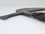 a knife that is laying on a table