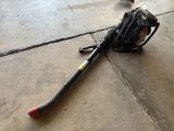 a baseball mitt and a baseball glove laying on the ground