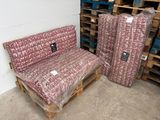 many pallets of furniture that are in a warehouse