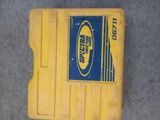 a yellow box that has a blue label on it