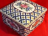an image of a decorative box on a red background