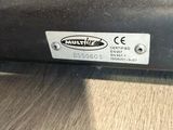 a close up of a metal object on a table