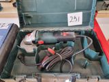 a tool box with tools in it on a table