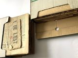 two boxes that are stacked on top of each other